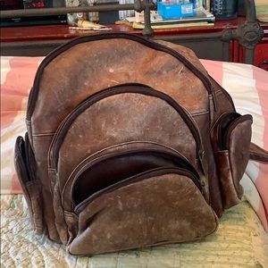 Vintage worn out Brown leather backpack